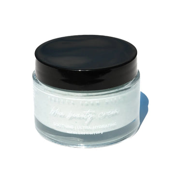 Pretty Farm Girl Blue Beauty Cream glass jar with black lid, side view