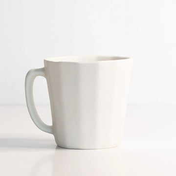 The Bright Angle handmade porcelain Daily Mug in Silk White, side view