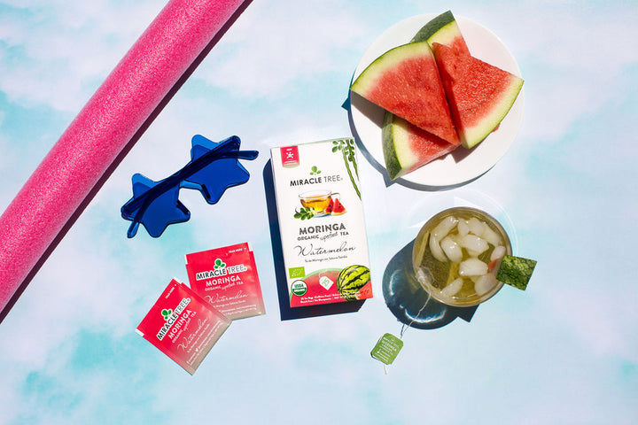 Watermelon moringa tea box with an iced tea and watermelon slices.