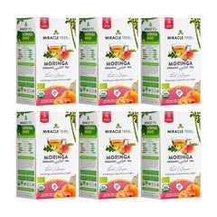 
                    
                      Biologische Moringa Thee - Perzik & Gember - Cafeïnevrij - Set van 6 (150 theezakjes) - Voorkant van de doos
                    
                  