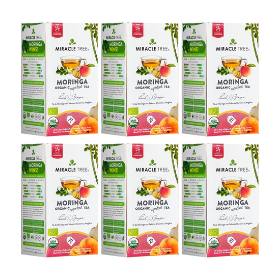 
                    
                      Chá de Moringa Orgânico - Pêssego e Gengibre - Chá de Ervas sem Cafeína - Kit com 6 (150 sachês de chá) - Frente da caixa
                    
                  